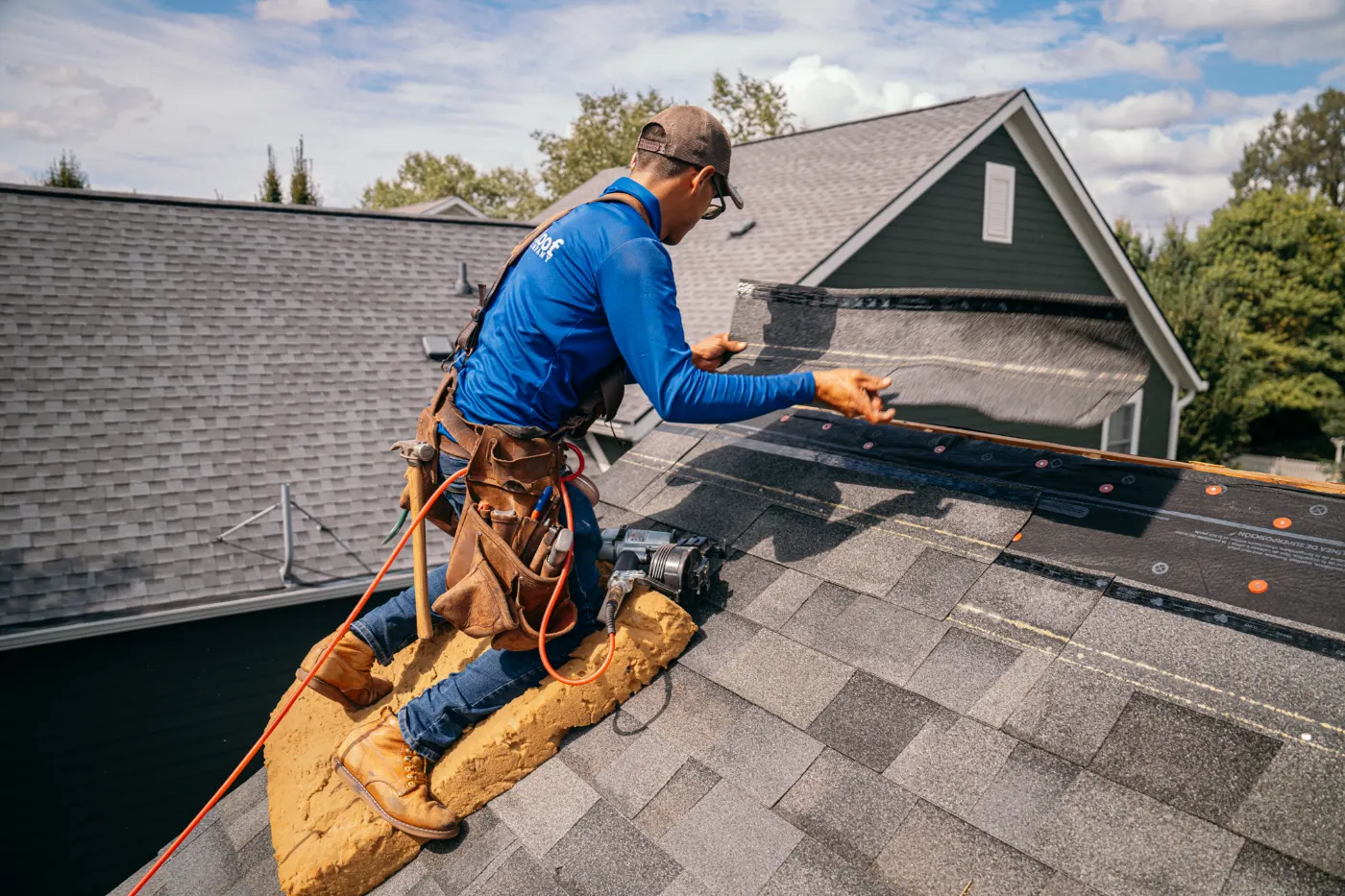 Tarping and dry-in on a Bicknell commercial roof
